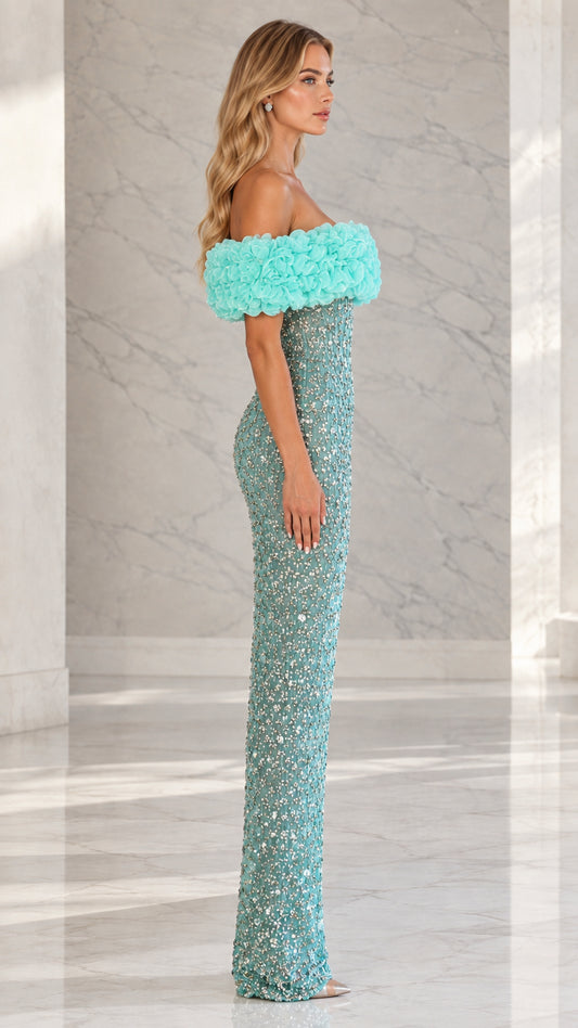 Side profile view of aqua blue embellished column gown showing sleek fit and floor length