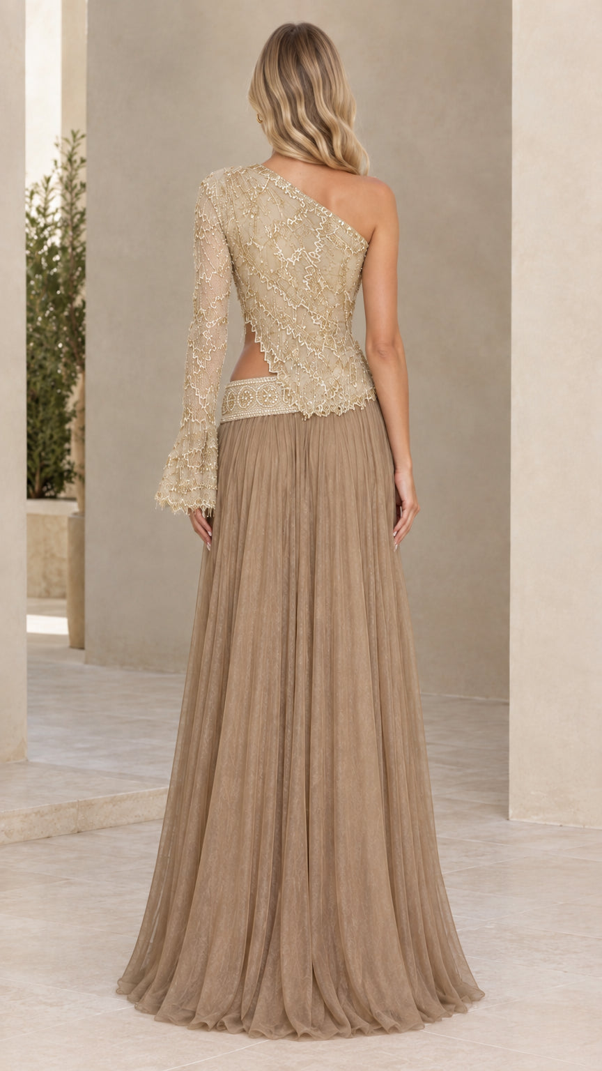 Back view of Champagne Gold cutout evening dress showing sheer pleated skirt