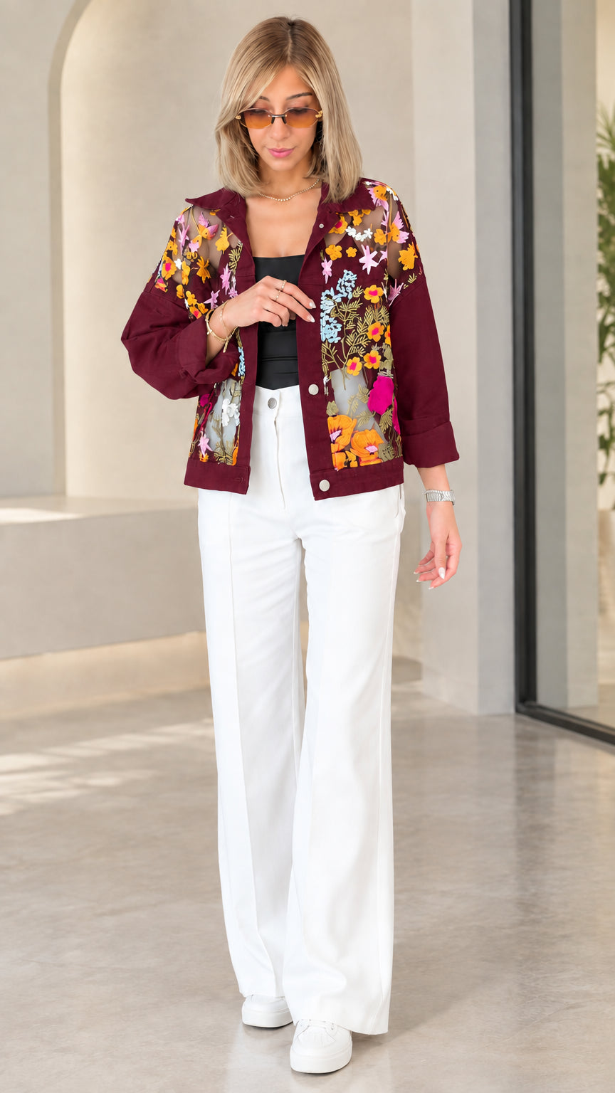 Model wearing burgundy floral embroidered sheer mesh shirt jacket with snap buttons