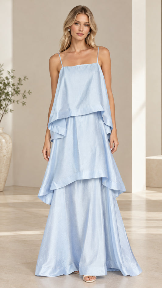 Model wearing light blue tiered cami maxi dress front view
