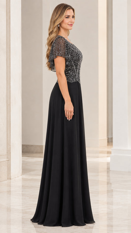 Side view of black beaded bodice formal gown with flutter sleeves
