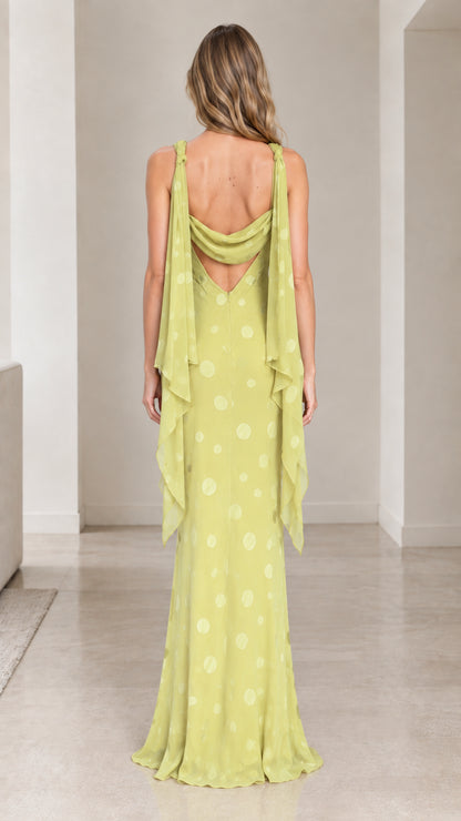 Back view of chartreuse cowl back maxi dress with shoulder streamers