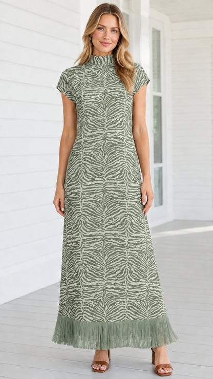 Model wearing sage green zebra print mock neck maxi dress with matching fringe hem