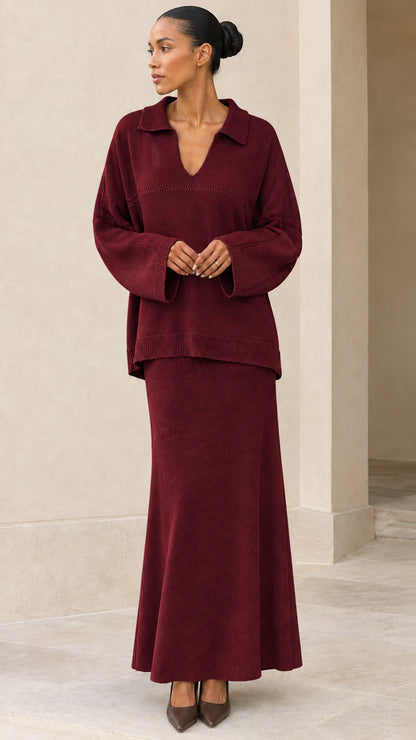 Front view of model wearing Burgundy wine knit two-piece sweater and skirt set
